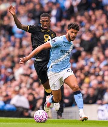 Matheus Nunes of Manchester City and Jaidon Anthony of Burnley Manchester City v Burnley, Premier League, Football, Etihad Stadium, Manchester, UK - 27 Sep 2025Manchester Etihad Stadium United Kingdom EDITORIAL USE ONLY No use with unauthorised audio, video, data, fixture lists, club league logos or live services. Online in-match use limited to 120 images, no video emulation. No use in betting, games or single club league player publications.  Copyright: xGreigxCowie Shutterstockx 15503920r