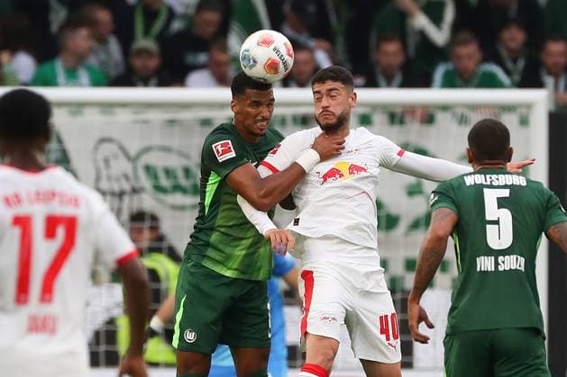 VfL vs Leipzig, 1 BL Wolfsburg, 27 09 2025, FOOTBALL VfL Wolfsburg vs RB Leipzig, 1 BL, Season 2025 26 Moritz Jenz VfL Wolfsburg , Romulo Cardoso RB Leipzig Wolfsburg