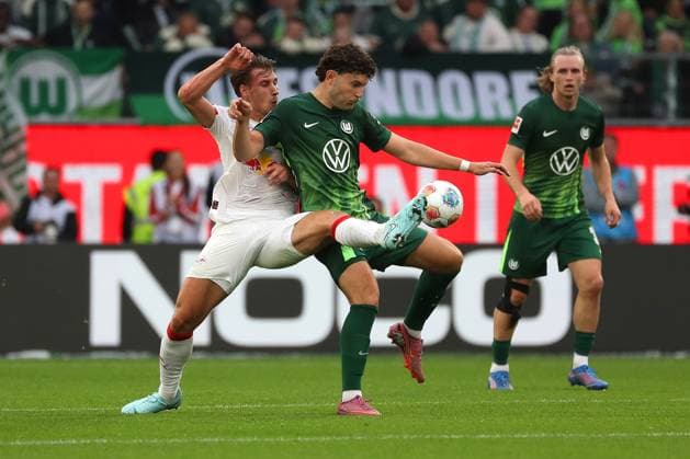 VfL vs Leipzig, 1 BL Wolfsburg, 27 09 2025, FOOTBALL VfL Wolfsburg vs RB Leipzig, 1 BL, Season 2025 26 Willi Orban RB Leipzig , Jonas Wind VfL Wolfsburg Wolfsburg