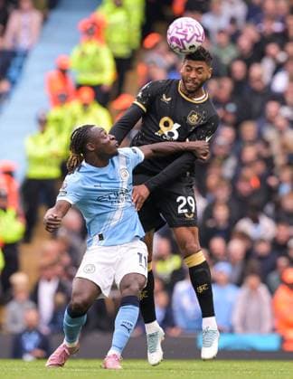 Jeremy Doku of Manchester City and Josh Laurent of Burnley Manchester City v Burnley, Premier League, Football, Etihad Stadium, Manchester, UK - 27 Sep 2025Manchester Etihad Stadium United Kingdom EDITORIAL USE ONLY No use with unauthorised audio, video, data, fixture lists, club league logos or live services. Online in-match use limited to 120 images, no video emulation. No use in betting, games or single club league player publications.  Copyright: xGreigxCowie Shutterstockx 15503920ab