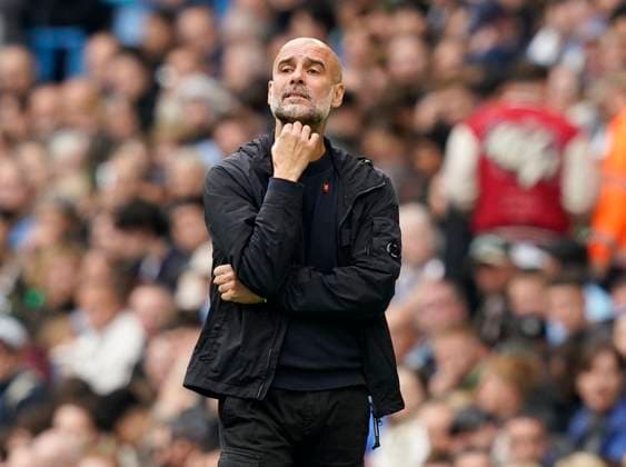 Manchester, England, 27th September 2025. Pep Guardiola coach of Manchester City during the Manchester City vs Burnley Premier League match at the Etihad Stadium, Manchester. Picture credit should read: Andrew Yates Sportimage EDITORIAL USE ONLY. No use with unauthorised audio, video, data, fixture lists, club league logos or live services. Online in-match use limited to 120 images, no video emulation. No use in betting, games or single club league player publications. SPI_011_AY_MAN_CITY_BURNLEY SPI-4169-0011