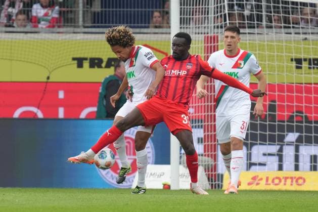 Bundesliga Men, Matchday 5, Season 2025 26, FC Heidenheim FC Augsburg Han Noah Massengo FC Augsburg , Sirlord Conteh FC Heidenheim FC Heidenheim FC Augsburg Bundesliga Men, Matchday 5, Season 2025 26, FC Heidenheim FC Augsburg Germany, Heidenheim, Voith Arena, 27 09 2025 SP_GHR