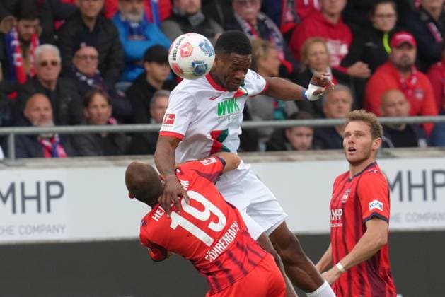 Bundesliga Men, Matchday 5, Season 2025 26, FC Heidenheim FC Augsburg Samuel Essende FC Augsburg , Jonas Foehrenbach FC Heidenheim FC Heidenheim FC Augsburg Bundesliga Men, Matchday 5, Season 2025 26, FC Heidenheim FC Augsburg Germany, Heidenheim, Voith Arena, 27 09 2025 SP_GHR