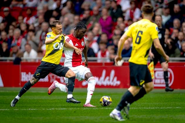 NAC Breda defender Boy Kemper, AFC Ajax Amsterdam forwarder Don-Angelo Konadu during the match AFC Ajax Amsterdam vs NAC Breda at the Johan Cruijff ArenA for the Dutch Vriendenloterij Eredivisie season 2025-2026 in AMSTERDAM, Netherlands on 27 september 2025, (photo by Marcel van Dorst EYE4images DeFodi Images) NAC Breda defender Boy Kemper, AFC Ajax Amsterdam forwarder Don Angelo Konadu during the match AFC Ajax Amsterdam vs NAC Breda at the Johan Cruijff ArenA for the Dutch Vriendenloterij Eredivisie season 2025 2026 in AMSTERDAM, Netherlands on 27 september 2025, photo by Marcel van Dorst EYE4images DeFodi Images