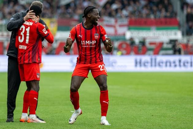 Omar Haktab Traore FC Heidenheim, 23 after goal for 1 0 by Mikkel Kaufmann FC Heidenheim, 29 , GER, 1 FC Heidenheim vs FC Augsburg, Football, Bundesliga, Matchday 5, Season 2025 2026, 27 09 2025, DFL DFB REGULATIONS PROHIBIT ANY USE OF PHOTOGRAPHS AS IMAGE SEQUENCES AND OR QUASI VIDEO, GER, 1 FC Heidenheim vs FC Augsburg, Football, Bundesliga, Matchday 5, Season 2025 2026, 27 09 2025 Heidenheim Copyright: xEibner-Pressefotox EP_EER