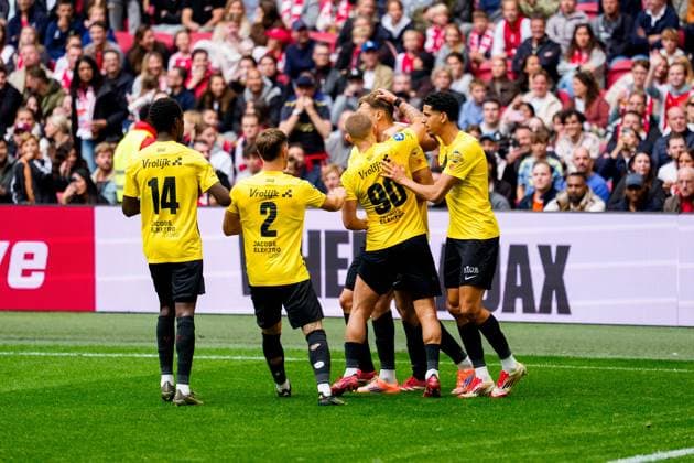 AMSTERDAM, 27-09-2025, Johan Cruijff ArenA , season 2025 2026 , Dutch Eredivisie Football . Match between Ajax and NAC Breda , Picture shows goal celebration by NAC Breda player Sydney van Hooijdonk Ajax - NAC  x31220889x Copyright: