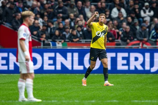 AMSTERDAM , 27-09-2025 , Johan Cruyff ArenA , season 2025 2026 , Dutch Eredivisie football . Match between Ajax and NAC Breda , Picture shows goal celebration NAC Breda player Sydney van Hooijdonk (1-1). Ajax - NAC  x31220993x Copyright: