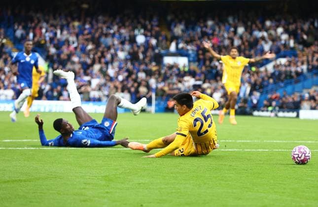 Diego Gomez of Brighton & Hove Albion is fouled by Trevoh Chalobah of Chelsea - red card given Chelsea v Brighton and Hove Albion, Premier League, Football, Stamford Bridge, London, UK - 27 Sep 2025London Stamford Bridge United Kingdom EDITORIAL USE ONLY No use with unauthorised audio, video, data, fixture lists, club league logos or live services. Online in-match use limited to 120 images, no video emulation. No use in betting, games or single club league player publications.  Copyright: xMichaelxZemanek Shutterstockx 15503910aa