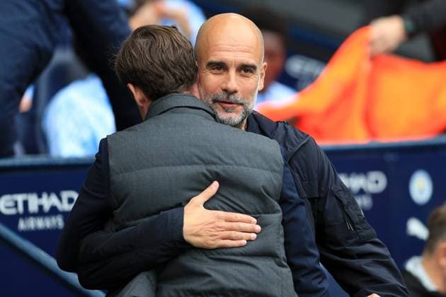 27th September 2025; Etihad Stadium, Manchester, England; Premier League Football, Manchester City versus Burnley; Manchester City manager Pep Guardiola greets Burnley manager Scott Parker  DavidxBlunsden