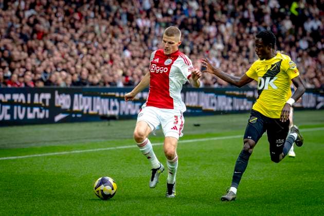 AFC Ajax Amsterdam defender Anton Gaaei, NAC Breda midfielder Kamal Sowah during the match AFC Ajax Amsterdam vs NAC Breda at the Johan Cruijff ArenA for the Dutch Vriendenloterij Eredivisie season 2025-2026 in AMSTERDAM, Netherlands on 27 september 2025, (photo by Marcel van Dorst EYE4images DeFodi Images) AFC Ajax Amsterdam defender Anton Gaaei, NAC Breda midfielder Kamal Sowah during the match AFC Ajax Amsterdam vs NAC Breda at the Johan Cruijff ArenA for the Dutch Vriendenloterij Eredivisie season 2025 2026 in AMSTERDAM, Netherlands on 27 september 2025, photo by Marcel van Dorst EYE4images DeFodi Images