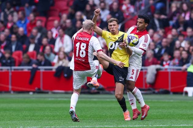 2025-09-27 AFC Ajax v NAC Breda - Dutch Eredivisie AMSTERDAM, NETHERLANDS - SEPTEMBER 27: Davy Klaassen of AFC Ajax, Sydney van Hooijdonk of NAC Breda, Owen Wijndal of AFC Ajax during the Dutch Eredivisie match between AFC Ajax and NAC Breda at Johan Cruijff ArenA on September 27, 2025 in Amsterdam, Netherlands. Amsterdam Johan Cruijff ArenA Netherlands Content not available for redistribution in The Netherlands directly or indirectly through any third parties. Copyright: xBenxGalx