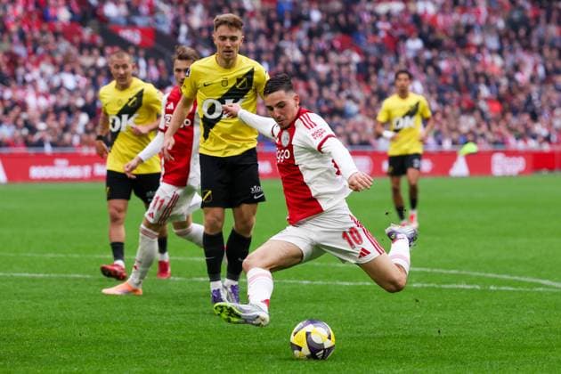 2025-09-27 AFC Ajax v NAC Breda - Dutch Eredivisie AMSTERDAM, NETHERLANDS - SEPTEMBER 27: Oscar Gloukh of AFC Ajax shoots during the Dutch Eredivisie match between AFC Ajax and NAC Breda at Johan Cruijff ArenA on September 27, 2025 in Amsterdam, Netherlands. Amsterdam Johan Cruijff ArenA Netherlands Content not available for redistribution in The Netherlands directly or indirectly through any third parties. Copyright: xBenxGalx