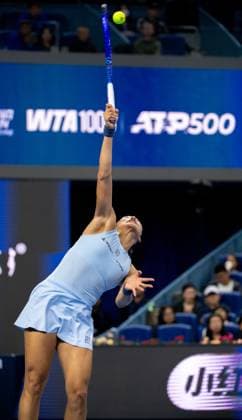 (250927) -- BEIJING, Sept. 27, 2025 -- Zheng Qinwen serves during the women s singles second round match between Zheng Qinwen of China and Emiliana Arango of Colombia at 2025 China Open tennis tournament in Beijing, China, Sept. 27, 2025. ) (SP)CHINA-BEIJING-TENNIS-CHINA OPEN-WOMEN S SINGLES-SECOND ROUND (CN) HuxJingwen 