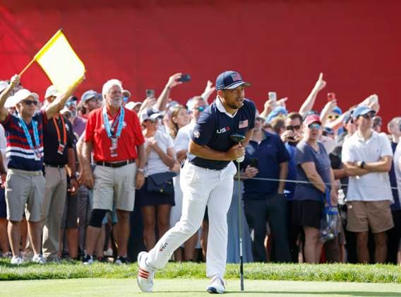 Xander Schauffele of Team United States reacts after his tee shot on the fifteenth hole during a foursomes match against Team Europe on day two of the 45th Ryder Cup at the Bethpage Black Course in Farmingdale, New York on Saturday, September 27, 2025. Europe has a 8.5 to 3.5 lead over the United States after the morning matches on the second day.  RYD20250927408 JOHNxANGELILLO