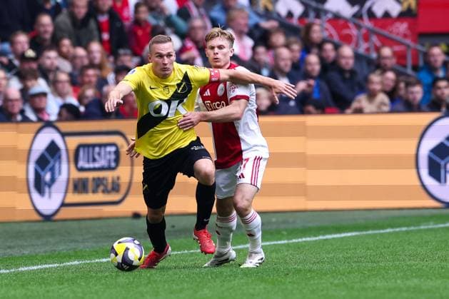 2025-09-27 AFC Ajax v NAC Breda - Dutch Eredivisie AMSTERDAM, NETHERLANDS - SEPTEMBER 27: Boy Kemper of NAC Breda, Olivier Edwardsen of AFC Ajax during the Dutch Eredivisie match between AFC Ajax and NAC Breda at Johan Cruijff ArenA on September 27, 2025 in Amsterdam, Netherlands. Amsterdam Johan Cruijff ArenA Netherlands Content not available for redistribution in The Netherlands directly or indirectly through any third parties. Copyright: xBenxGalx
