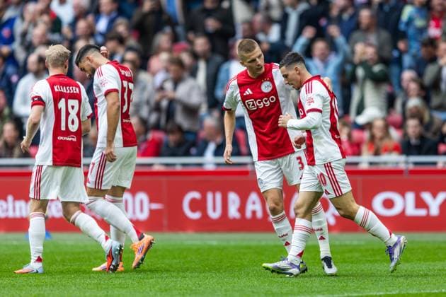 AMSTERDAM , 27-09-2025 , Johan Cruyff ArenA , season 2025 2026 , Dutch Eredivisie football . Match between Ajax and NAC Breda , Picture shows goal celebration Ajax player Oscar Gloukh with Ajax player Anton Gaaei (final score 2-1). Ajax - NAC  x31225443x Copyright: