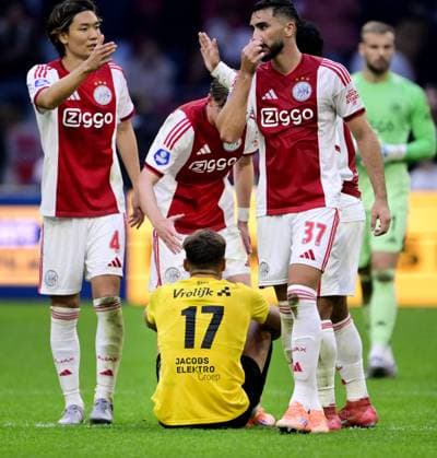 AMSTERDAM - Ko Itakura, Josip Sutalo of Ajax, Kenneth Taylor of Ajax with Sydney van Hooijdonk of NAC after the Dutch Eredivisie match between AFC Ajax and NAC Breda at the Johan Cruijff ArenA on September 27, 2025, in Amsterdam, Netherlands. ANP OLAF KRAAK Eredivisie 2025 26 xVIxANPxSportx xxANPxIVx 537636241 originalFilename: 537636241.jpg