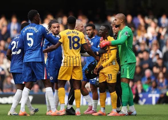 27th September 2025; Stamford Bridge, Chelsea, London, England: Premier League Football, Chelsea versus Brighton and Hove Albion; Yankuba Minteh of Brighton &amp; Hove Albion being pulled back by Goalkeeper Robert Sanchez of Chelsea  JohnxPatrickxFletcher