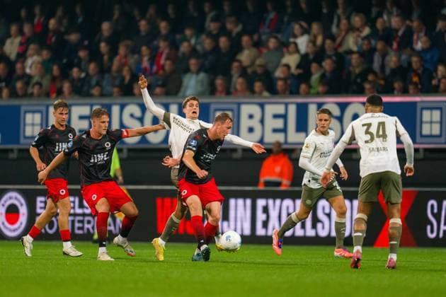 ROTTERDAM , 27-09-2025 , Stadium Woudestein , season 2025 2026 , VriendenLoterij Eredivisie , Excelsior vs PSV Eindhoven , Excelsior player Noah Naujoks, Excelsior player Casper Widell, PSV Player Guus Til, Excelsior player Adam Carlen and PSV Player Joey Veerman Excelsior - PSV  x31228330x Copyright: