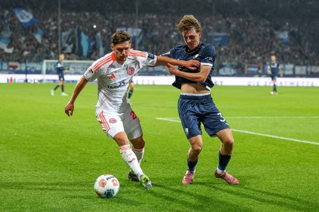 Bochum, Germany, 27 09 25 Florent Muslija Fortuna Düsseldorf and Kacper Koscierski VfL Bochum fighting for the ball during the 2 Bundesliga match between VfL Bochum Fortuna Düsseldorf at the Vonovia Ruhrstadion on September 27, 2025 in Bochum, Germany Bochum Vonovia Ruhrstadion Germany Copyright: xStefanxBrauer Brauer-Fotoagenturx