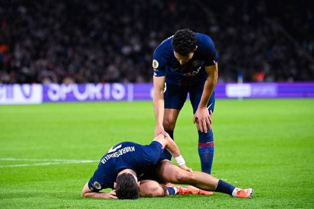 FOOTBALL : PSG vs Auxerre - Ligue1 - 27 09 2025 Goncalo Ramos ( 9 - PSG ) consoles Khvicha Kvaratskhelia ( 7 - PSG ) during the Ligue 1 match between Paris Saint Germain and AJ Auxerre at Parc Des Princes on September 27 , 2025 in Paris, France. ( Photo by Federico Pestelini PsnewZ ) - ParisFrance  Copyright: xFedericoxPestelinix