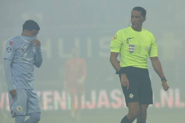 Sayfallah Ltaief of Sparta Rotterdam and Referee Gozubuyuk in the smoke from fireworks during the match Heracles Almelo vs Sparta Rotterdam at the Asito stadium for the Dutch Vriendenloterij Eredivisie season 2025-2026 in ALMELO, Netherlands on 27 september 2025, (photo by Peter Lous EYE4images DeFodi Images) Sayfallah Ltaief of Sparta Rotterdam and Referee Gozubuyuk in the smoke from fireworks during the match Heracles Almelo vs Sparta Rotterdam at the Asito stadium for the Dutch Vriendenloterij Eredivisie season 2025 2026 in ALMELO, Netherlands on 27 september 2025, photo by Peter Lous EYE4images DeFodi Images