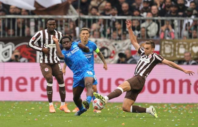 Photo Ernest POKU Leverkusen vs James Sands Pauli , right Football 1 Bundesliga , Matchday 5 on Sat 27 09 2025 FC St Pauli Bayer 04 Leverkusen 1 2
