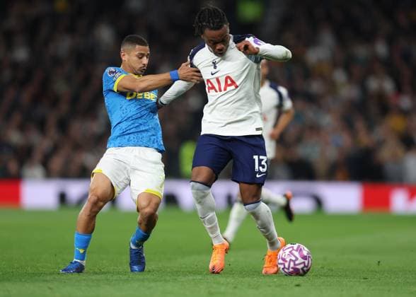 London, England, 27th September 2025. Andre of Wolverhampton Wanderers and Destiny Udogie of Tottenham Hotspur challenge for the ball during the Tottenham Hotspur vs Wolverhampton Wanderers Premier League match at the Tottenham Hotspur Stadium, London. Picture credit should read: Paul Terry Sportimage EDITORIAL USE ONLY. No use with unauthorised audio, video, data, fixture lists, club league logos or live services. Online in-match use limited to 120 images, no video emulation. No use in betting, games or single club league player publications. SPI_060_PT_Tottenham_Wolves SPI-4168-0060