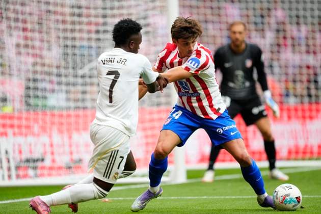 Atletico de Madrid v Real Madrid CF - LaLiga EA Sports Robin Le Normand centre-back of Atletico de Madrid and Spain and Vinicius Junior left winger of Real Madrid and Brazil compete for the ball during the LaLiga EA Sports match between Atletico de Madrid and Real Madrid CF at Riyadh Air Metropolitano on September 27, 2025 in Madrid, Spain. Madrid Spain  Copyright: xJosexBretonx originalFilename:bretonhernandez-atletico250927_np4UU.jpg