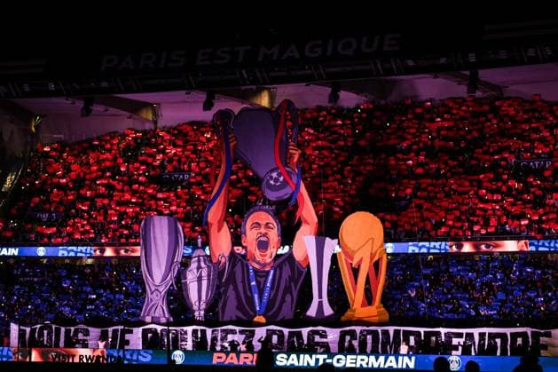 Ligue 1 PSG vs AJ Auxerre - FA Paris Saint-Germain’s supporters hang a banner showing Paris Saint-Germain’s defender Marquinhos with Champions League Cup before the French L1 football match between Paris Saint-Germain and AJ Auxerre at the Parc des Princes stadium in Paris on September 27, 2025. Photo by Firas Abdullah ABACAPRESS.COM Paris Île-de-France France  Copyright: xAbdullahxFiras ABACAx