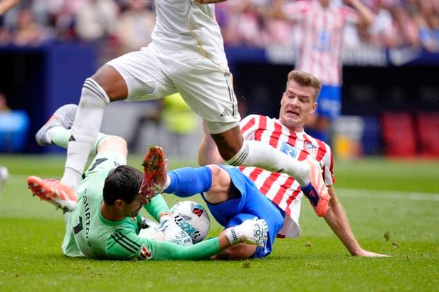 September 27, 2025, Madrid, Spain: Thibaut Courtois of Real Madrid CF and Alexander Sorloth of AtlÃ tico de Madrid are seen in action during the La Liga EA Sports match between Atletico de Madrid and Real Madrid at the Riyadh Air Metropolitano. Final Score; Atletico de Madrid 5 : 2 Real Madrid Madrid Spain - ZUMAs197 20250927_aaa_s197_255 Copyright: xGokhanxTanerx