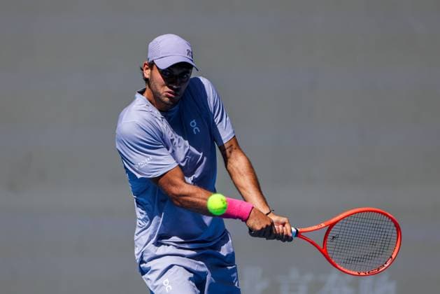 BEIJING, CHINA - SEPTEMBER 28: Flavio Cobolli of Italy returns a shot in the Men s Singles Round of 16 match against Learner Tien of the United States on day 7 of the 2025 China Open at National Tennis Center on September 28, 2025 in Beijing, China.  Copyright: xVCGx 111593673071