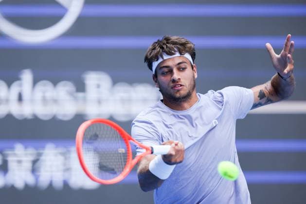 BEIJING, CHINA - SEPTEMBER 28: Flavio Cobolli of Italy returns a shot in the Men s Singles Round of 16 match against Learner Tien of the United States on day 7 of the 2025 China Open at National Tennis Center on September 28, 2025 in Beijing, China.  Copyright: xVCGx 111593671829