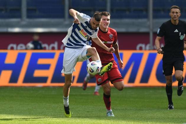 Rasim Bulic MSV Duisburg in duel with Jonas Scholz FC Ingolstadt 04 GER, MSV Duisburg vs FC Ingolstadt 04, Football, 3 Liga, Matchday 8, Season 2025 2026, 27 09 2025 DFL DFB REGULATIONS PROHIBIT ANY USE OF PHOTOGRAPHS AS IMAGE SEQUENCES AND OR QUASI VIDEO GER, MSV Duisburg vs FC Ingolstadt 04, Football, 3 Liga, Matchday 8, Season 2025 2026, 27 09 2025 Duisburg Copyright: xEibner-Pressefoto ThomasxThienelx EP_TTL