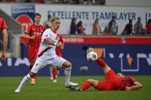 Phillip TIETZ Augsburg , Action,Duel Football 1 Bundesliga Season 2025 2026, 5 Matchday, Matchday05 1 FC Heidenheim FC Augsburg 2 1 on 27 09 2025, VOITH ARENA