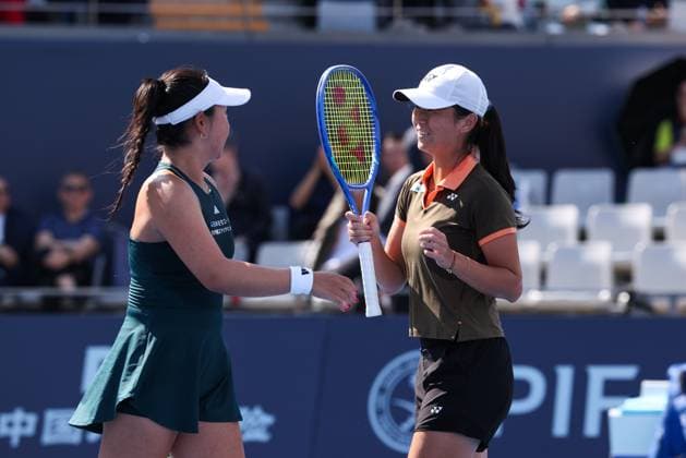 BEIJING, CHINA - SEPTEMBER 28: Wu Fang-Hsien of Chinese Taipei and Eri Hozumi of Japan compete in the Women s Doubles Round of 32 match against Maya Joint of Australia and Catherine Mcnally of the United States on day 7 of the 2025 China Open at National Tennis Center on September 28, 2025 in Beijing, China.  Copyright: xVCGx 111593686698