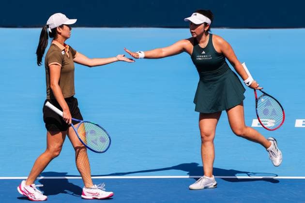 BEIJING, CHINA - SEPTEMBER 28: Wu Fang-Hsien of Chinese Taipei and Eri Hozumi of Japan compete in the Women s Doubles Round of 32 match against Maya Joint of Australia and Catherine Mcnally of the United States on day 7 of the 2025 China Open at National Tennis Center on September 28, 2025 in Beijing, China.  Copyright: xVCGx 111593672647