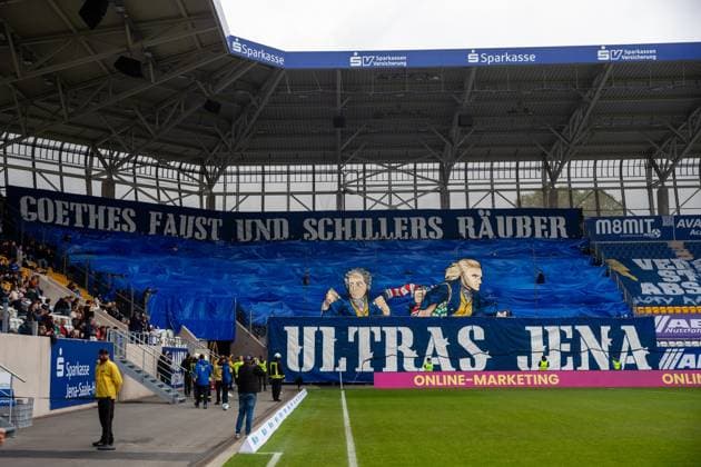 Jena , 270925, Soccer Regionalliga , FC Carl Zeiss Jena vs Chemnitzer FC in the picture choreography of the Horda Azzuro Ultras section Weimar