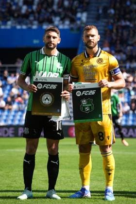 SassuoloÕs Domenico Berardi and Udinese s Jesper Karlstrom with the card of FC26CopySwap during the Serie A soccer match between Sassuolo and Udinese at the Mapei Stadium Cittˆ del Tricolore in Reggio Emilia, north Italy - Sunday, September 28, 2025 - - Soccer -  Copyright: xMassimoxPaolone LaPressex