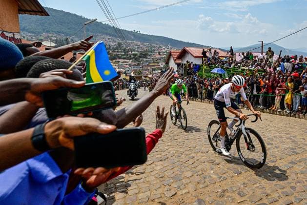 Slovenian Tadej Pogacar and Mexican Isaac Del Toro pictured in action during the elite men road race (267,5 km) at the cycling road World Championships in Kigali, Rwanda, Sunday 28 September 2025. The 2025 UCI Road World Championships take place from 21 to 28 September in Kigali, Rwanda. DIRKxWAEM  x135511432x