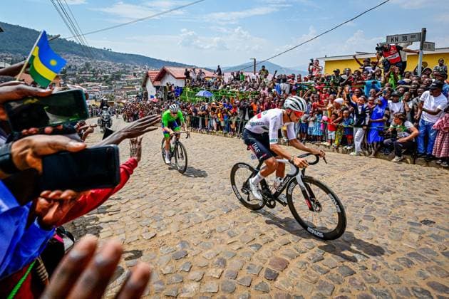 Slovenian Tadej Pogacar and Mexican Isaac Del Toro pictured in action during the elite men road race (267,5 km) at the cycling road World Championships in Kigali, Rwanda, Sunday 28 September 2025. The 2025 UCI Road World Championships take place from 21 to 28 September in Kigali, Rwanda. DIRKxWAEM  x135511638x