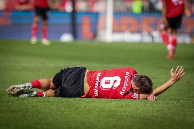 Adam Markhiyev 6 1FC Nuernberg has to leave the pitch injured after a tackle, 1 FC Nuernberg vs Hertha BSC Berlin, DFL, 2 Bundesliga, Saison 2025 2026, Max Morlock Stadion, Hinrunde, 7 Spieltag, 28 09 2025 DFB regulations prohibit any use of photographs as image sequences and or quasi video Nuernberg Bayern Germany Copyright: xkolbert-press MartinxAgüerax