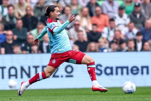 2025-09-28 FC Groningen v Feyenoord - Dutch Eredivisie GRONINGEN, NETHERLANDS - SEPTEMBER 28: Anis Hadj Moussa of Feyenoord runs with the ball during the Dutch Eredivisie match between FC Groningen and Feyenoord at Stadion Euroborg on September 28, 2025 in Groningen, Netherlands. Groningen Stadion Euroborg Netherlands Content not available for redistribution in The Netherlands directly or indirectly through any third parties. Copyright: xPieterxvanxderxWoudex