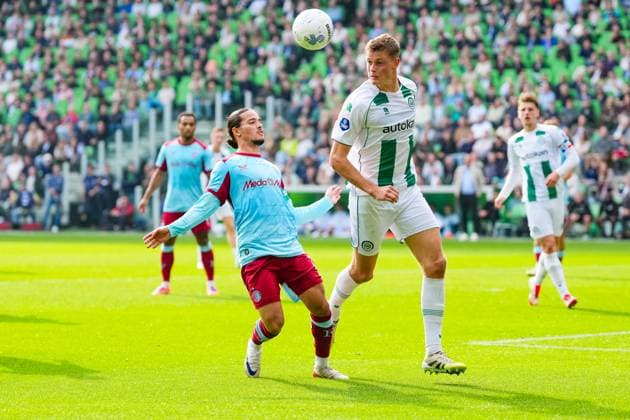 Eredivisie: FC Groningen v Feyenoord Rotterdam Groningen - Anis Moussa of Feyenoord Rotterdam, Dies Janse of FC Groningen during the seventh competition round of the 2025 2026 Eredivisie season. The match is set between FC Groningen and Feyenoord Rotterdam at De Euroborg on 28 September 2025 in Groningen, The Netherlands. Copyright: xYannickxVerhoevenx