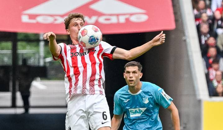 Patrick Osterhage SC Freiburg, 06 receiving the ball in front of Robin Hranac TSG Hoffenheim, 02 GER, SC Freiburg TSG 1899 Hoffenheim, Football, Bundesliga, Matchday 5, Season 2025 2026, 28 09 2025 DFL DFB REGULATIONS PROHIBIT ANY USE OF PHOTOGRAPHS AS IMAGE SEQUENCES AND OR QUASI VIDEO GER, SC Freiburg TSG 1899 Hoffenheim, Football, Bundesliga, Matchday 5, Season 2025 2026, 28 09 2025 Freiburg Copyright: xEibner-Pressefoto ThomasxHessx EP_THS