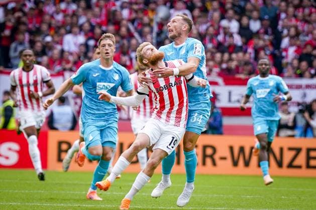 Germany Soccer Bundesliga 2025 26, Matchday 5 SC Freiburg vs TSG Hoffenheim Europa Park Stadion Freiburg Jan Niklas Beste SC Freiburg, 19 and Vladimir Coufal Vladimir Coufal TSG Hoffenheim, 34 Copyright: xJOERANxSTEINSIEKx