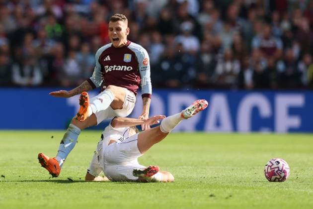 Timothy Castagne of Fulham tackles Lucas Digne of Aston Villa Aston Villa v Fulham, Premier League, Football, Villa Park, Birmingham, UK - 28 Sep 2025Birmingham Villa Park United Kingdom EDITORIAL USE ONLY No use with unauthorised audio, video, data, fixture lists, club league logos or live services. Online in-match use limited to 120 images, no video emulation. No use in betting, games or single club league player publications. Copyright: xPaulxCurrie Shutterstockx 15503933en
