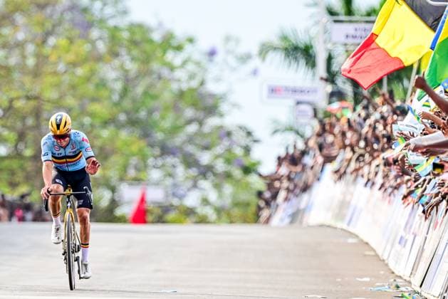 Belgian Remco Evenepoel crosses the finish line of the elite men road race (267,5 km) at the cycling road World Championships in Kigali, Rwanda, Sunday 28 September 2025. The 2025 UCI Road World Championships take place from 21 to 28 September in Kigali, Rwanda. DIRKxWAEM  x135526188x