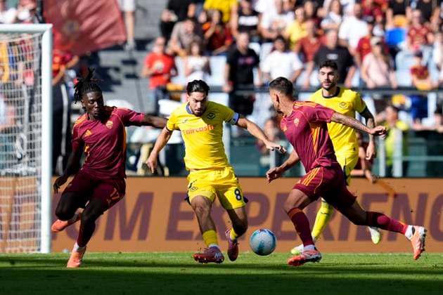 Manu Kone (AS Roma) and Suat Serdar (Hellas Verona) battle for the ball, Serie A, AS Roma v Hellas Verona FC, Olimpico Stadium, September 28, 2025, Roma, Italy.