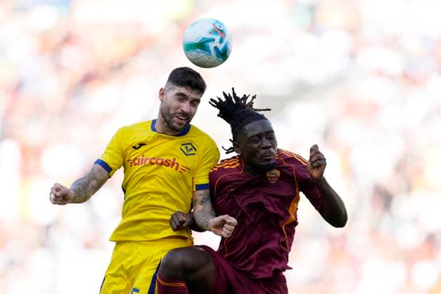 Manu Kone (AS Roma) and Unai Nunez (Hellas Verona) battle for the ball, Serie A, AS Roma v Hellas Verona FC, Olimpico Stadium, September 28, 2025, Roma, Italy.